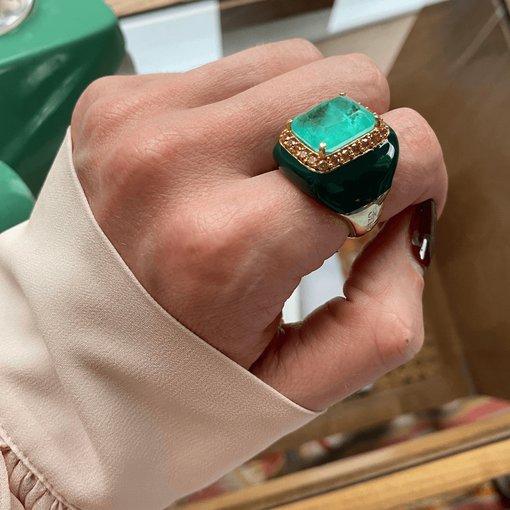 AMELIA statement ring, dark green enamel band with aquamarine green center stone and champagne pavé halo, worn on hand. GIADAN for Le.Paul Jewelgarden