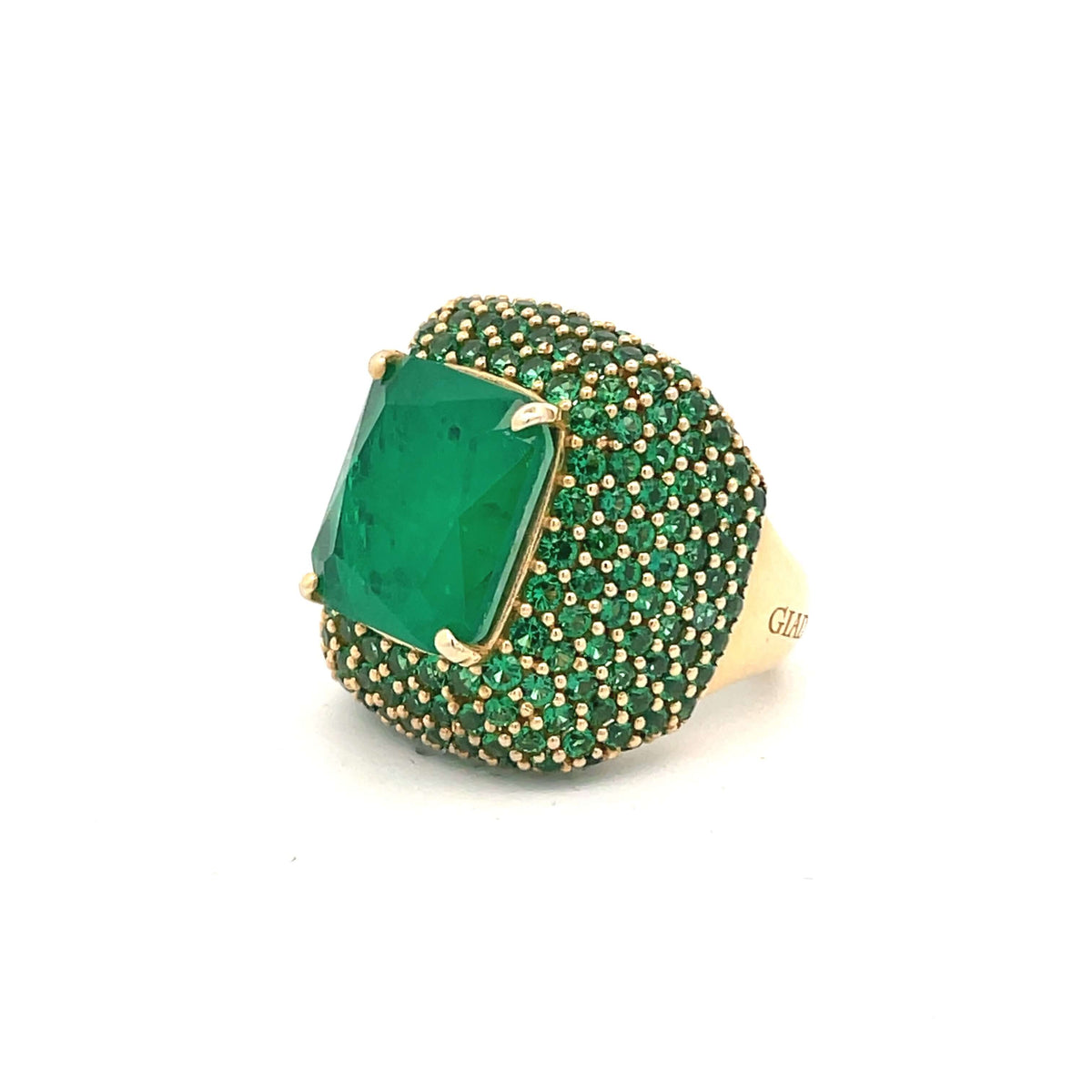 WILLOW cocktail ring angled view showing 22mm width and stone detail. Large Emerald-green center stone and emerald-green pavé zirconia side stones. Yellow gold plated.
