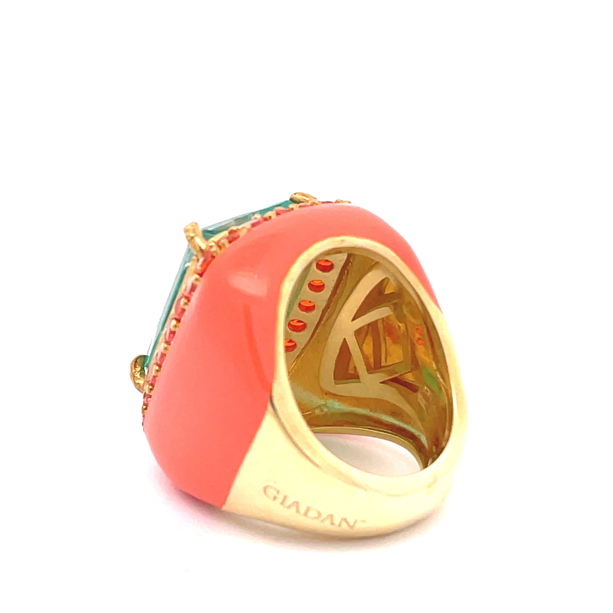 Backview of yellow gold plated XL statement ring with salmon enamel, large aquamarine green zirconia center stone and orange zirconia halo = YASMINE by Giadan for Le.Paul Jewelgarden