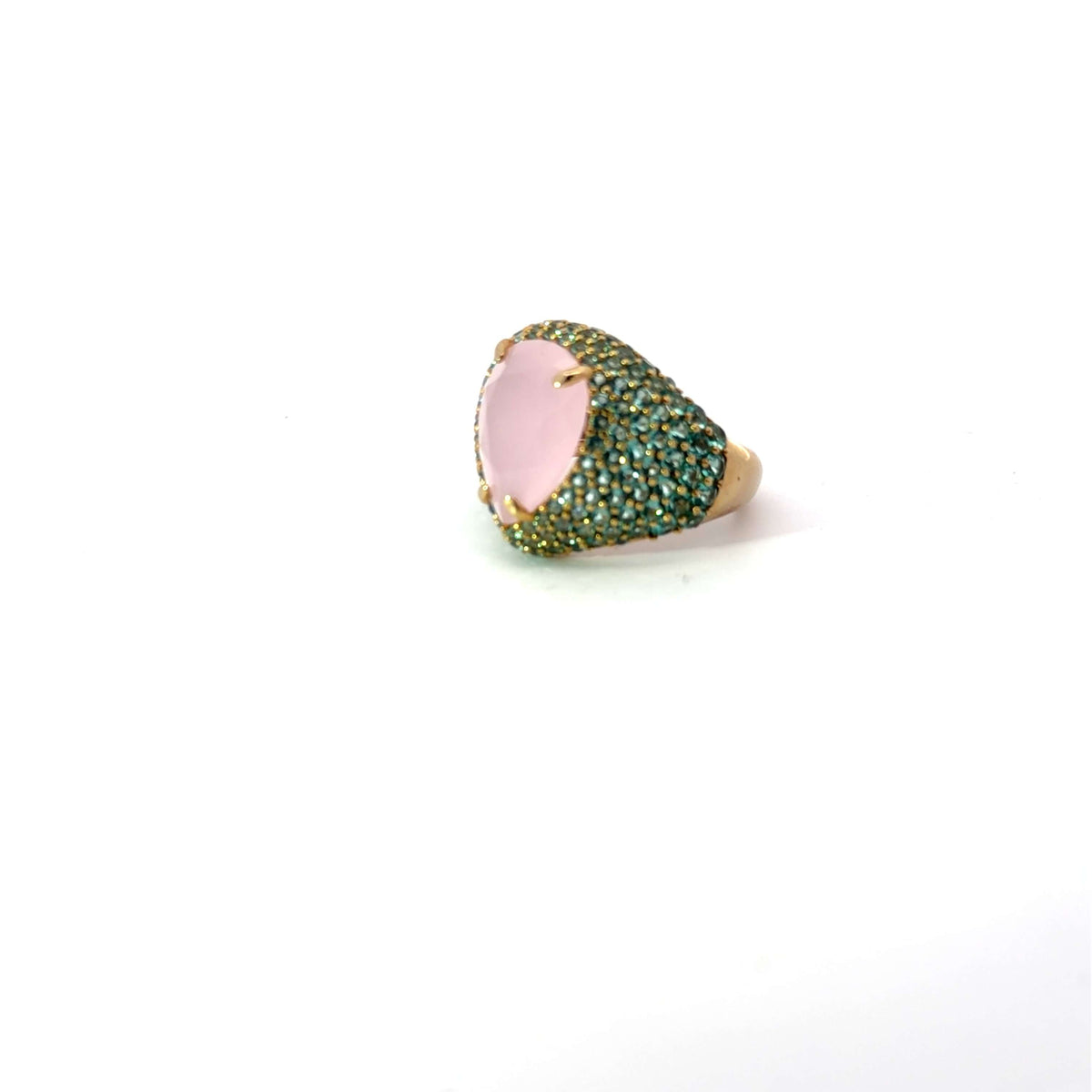 CELESTE statement ring, pear-cut pale pink center stone with green pavé zirconias, angled view