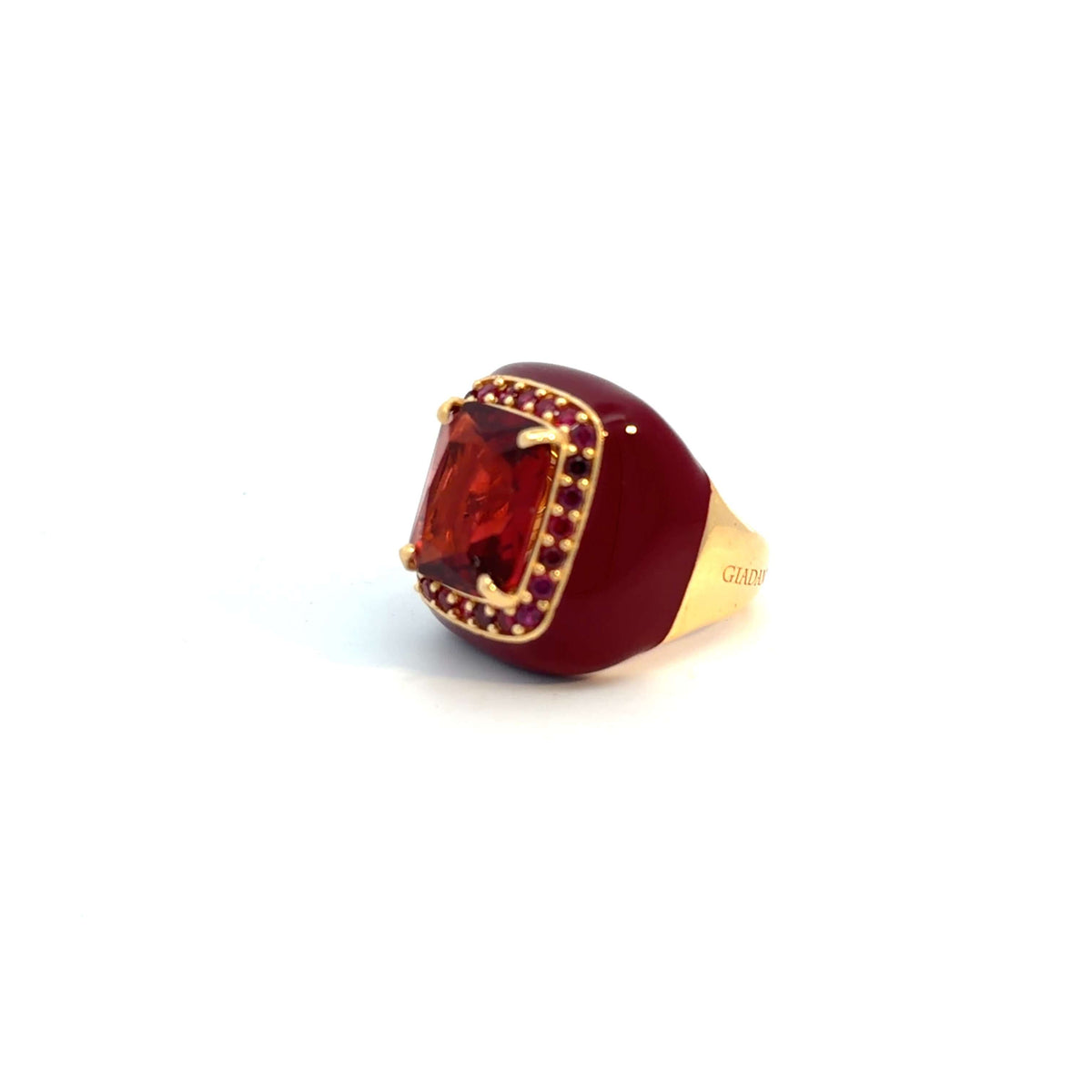 MARCHIEN statement ring, plum enamel band, red zirconia halo and deep red center stone, angled view