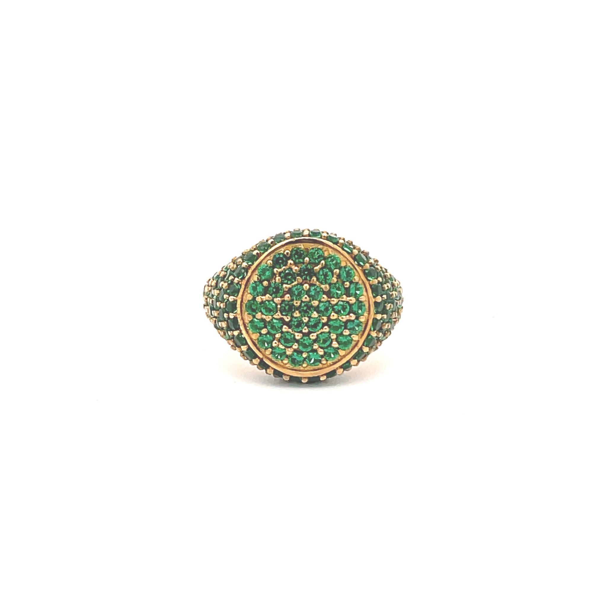 A yellow gold plated pinky ring with pavé set green zirconia on the top and sides PINKY PROMISE - Le.Paul.