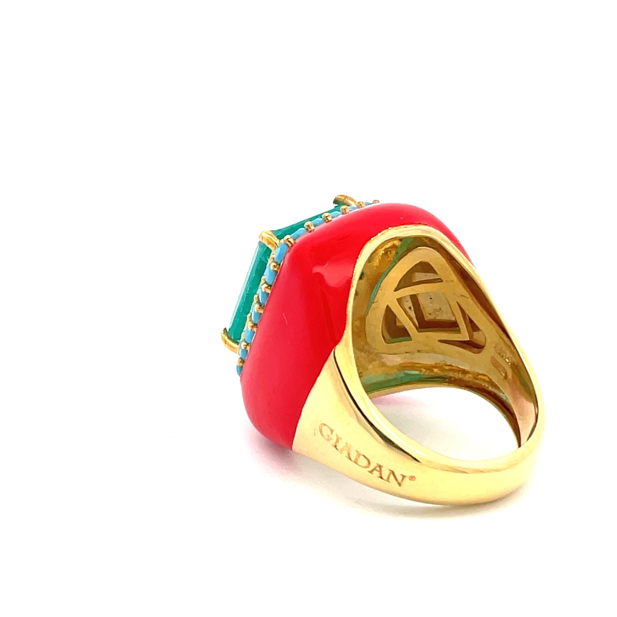 Yellow gold plated statement ring with Ferrari red enamel and turquoise blue stones. Viewd from back with integrated size-adjusting system.