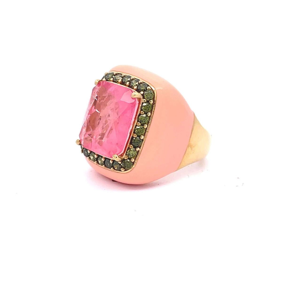 Yellow gold plated statement ring with peach pink enamel, pink doublette center stone and peridot green pavé zirconias, sideview.