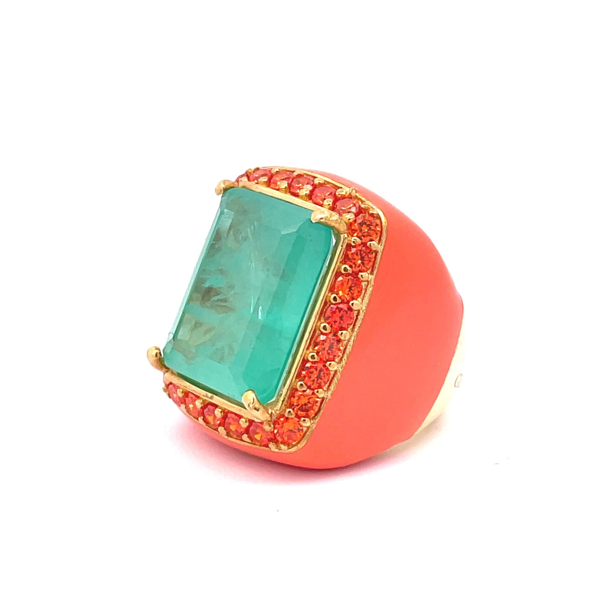 YASMINE's LITTLE SISTER Yellow gold plated oversized statement ring with salmon enamel, large aquamarine green doublette center stone and orange zirconia halo, side view — by Giadan for Le.Paul Jewelgarden