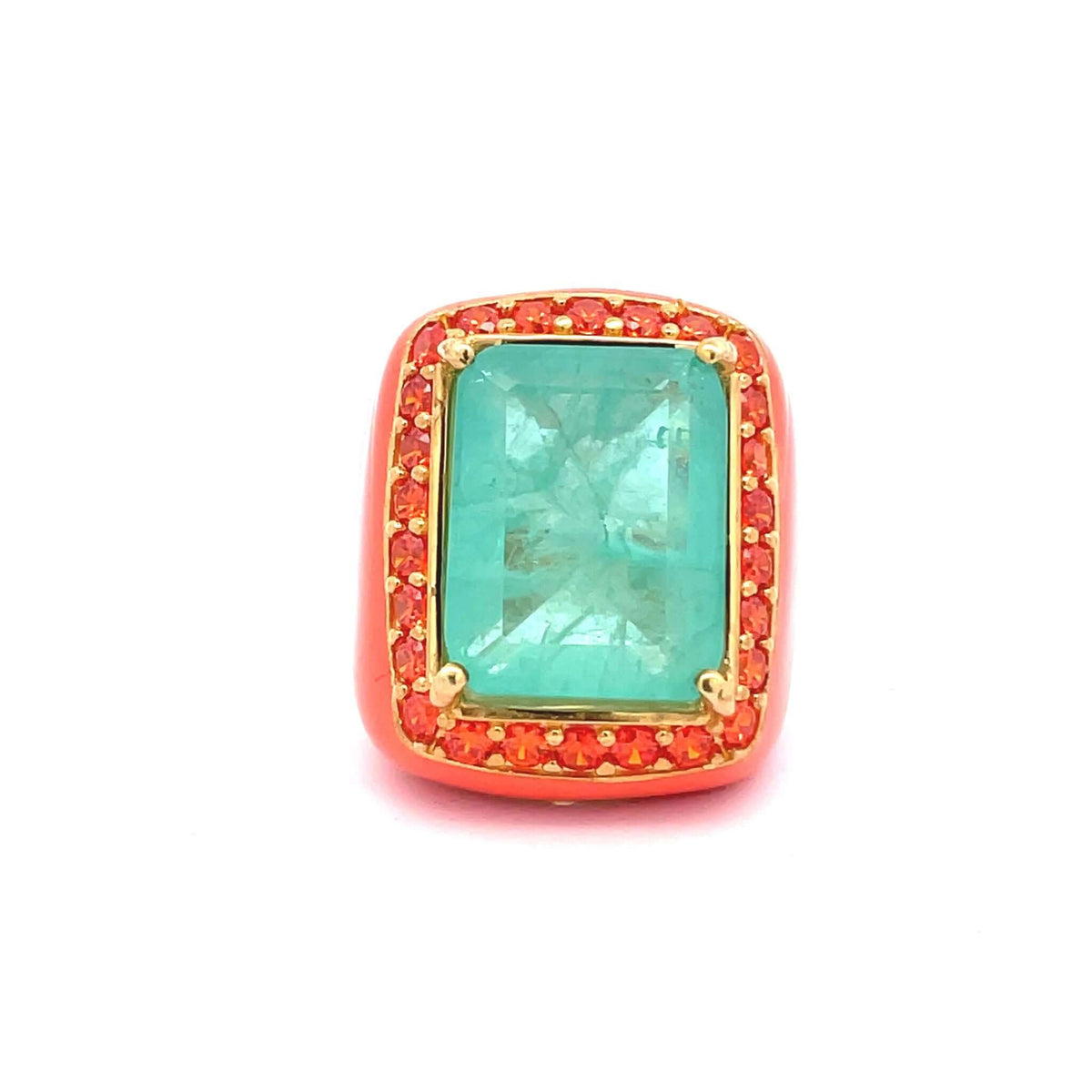 A yellow gold plated ring with salmon enamel detailing, featuring a large aquamarine green doublette surrounded by orange cubic zirconias. XL Statement ring by Giadan for Le.Paul