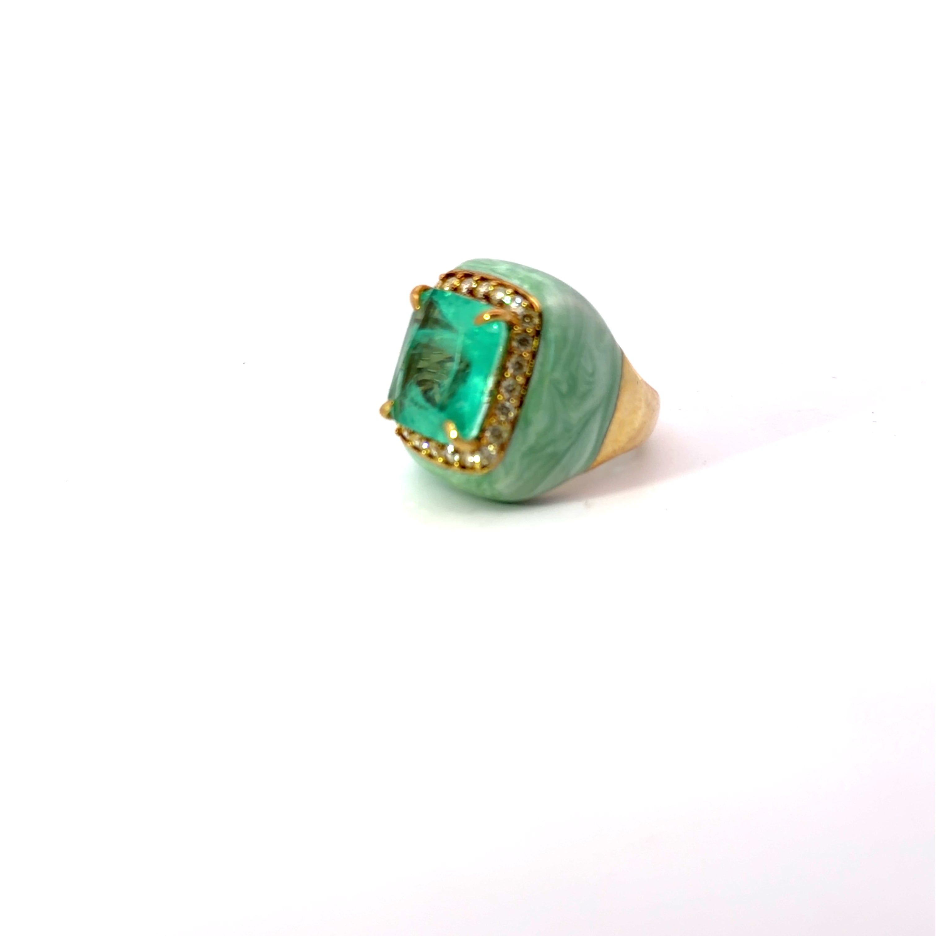 VALENTINA statement ring viewed from the side, with large aqua green center stone, marbled light green enamel and champagne pavé, yellow gold plated. GIADAN for Le.Paul Jewelgarden