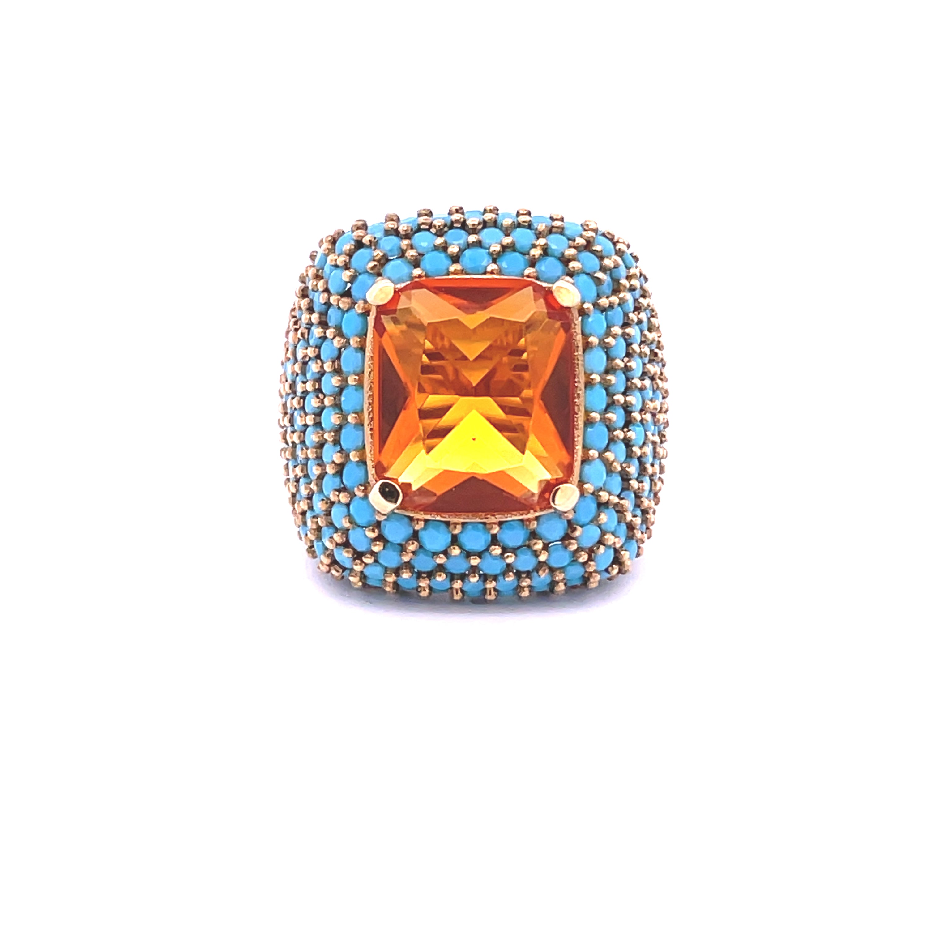 AFET Yellow and turquoise                                                                                cocktail ring top view showing center stone and yellow gold plated setting