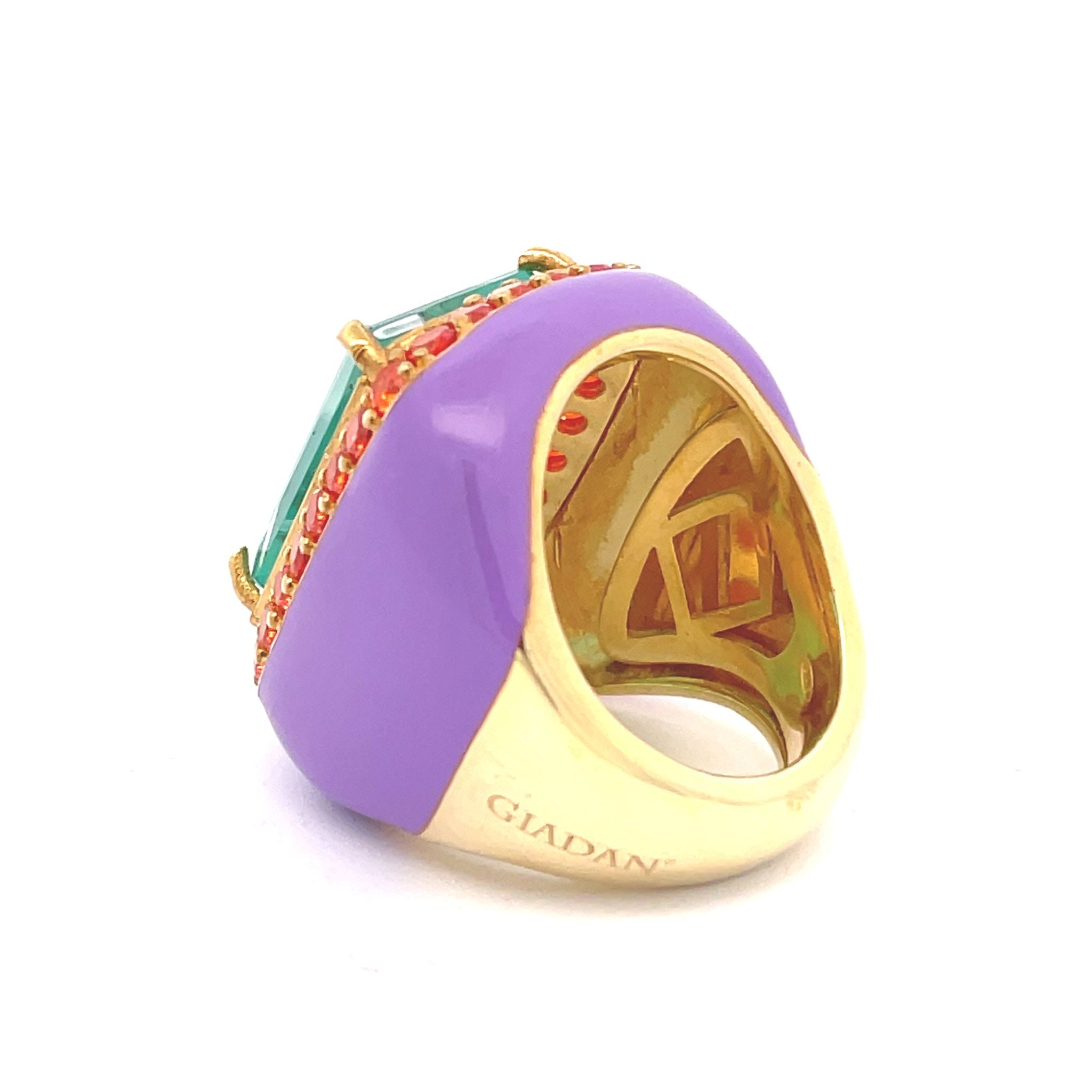 Sideview of LOTTE - a yellow gold plated oversized statement ring with lilac enamel, large aquamarine green zirconia center stone and orange zirconia halo - by Giadan for Le.Paul Jewelgarden