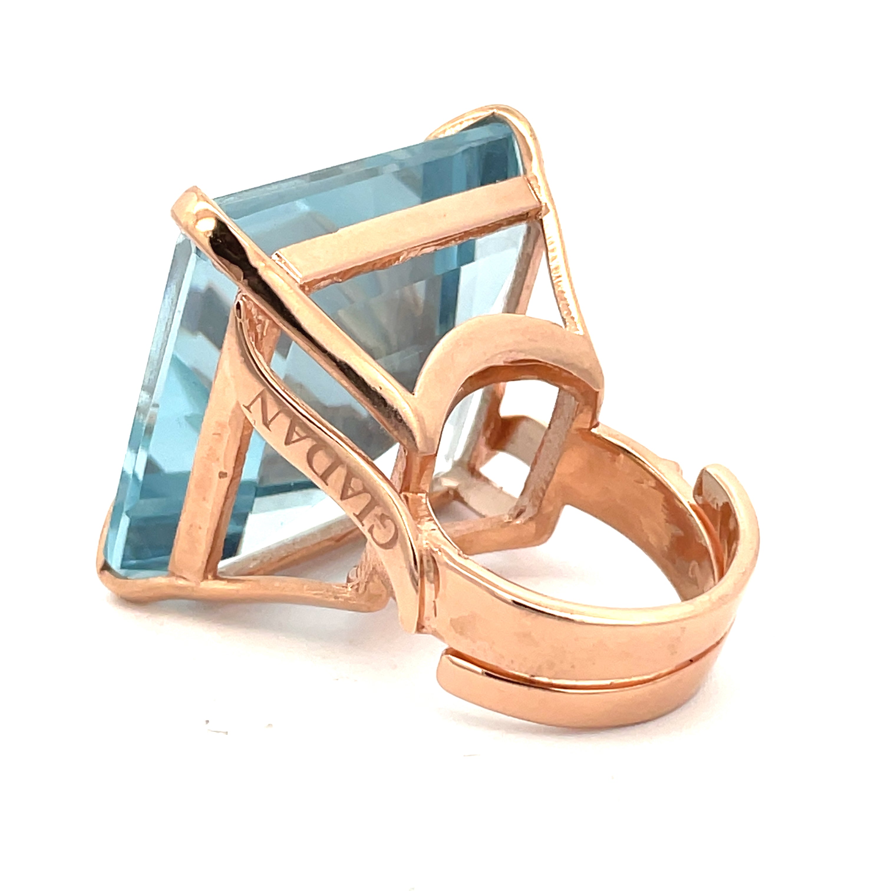 Backview of rose gold plated statement ring with large aquamarine blue zirconia in open architectural frame - NARCISA AQUA by Giadan for Le.Paul Jewelgarden