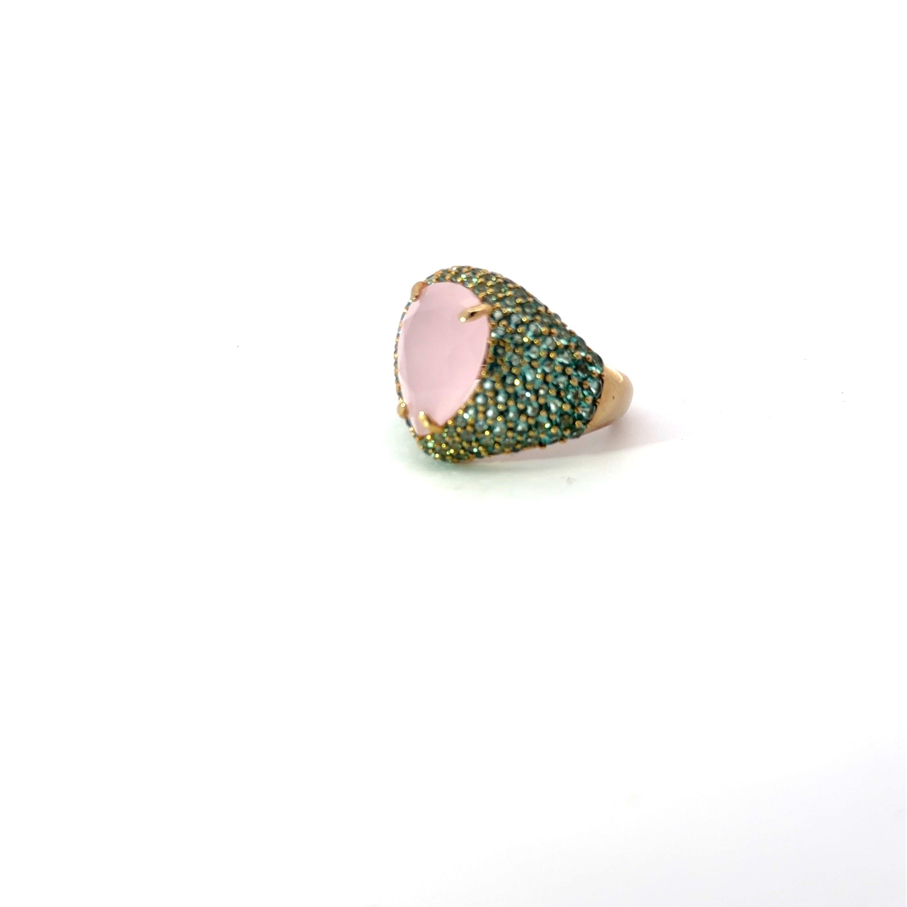CELESTE statement ring, pear-cut pale pink center stone with green pavé zirconias, angled view