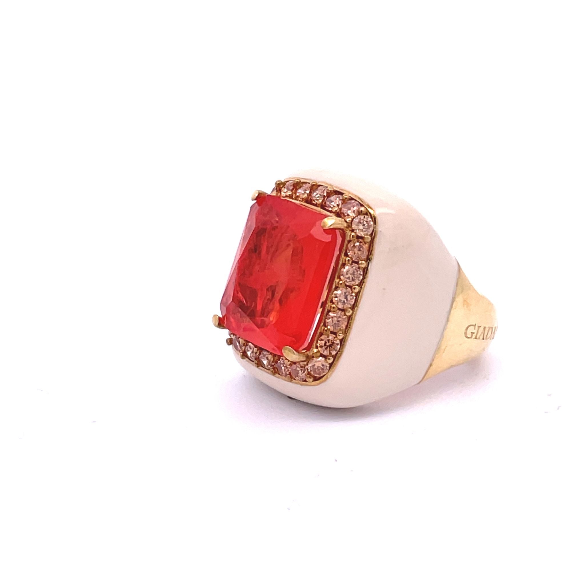 Side view of HANNA yellow gold plated statement ring with light ivory enamel, orange doublette center stone and champagne pavé zirconias — by Giadan for Le.Paul Jewelgarden