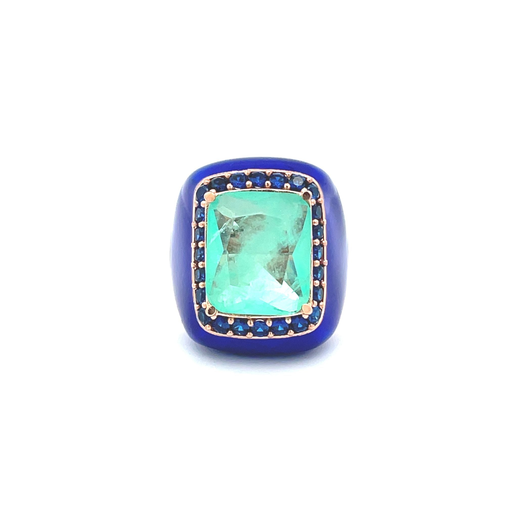 Front view of Laila Statement ring with Aqua green center stone, deep blue zirconias and deep blue enamel