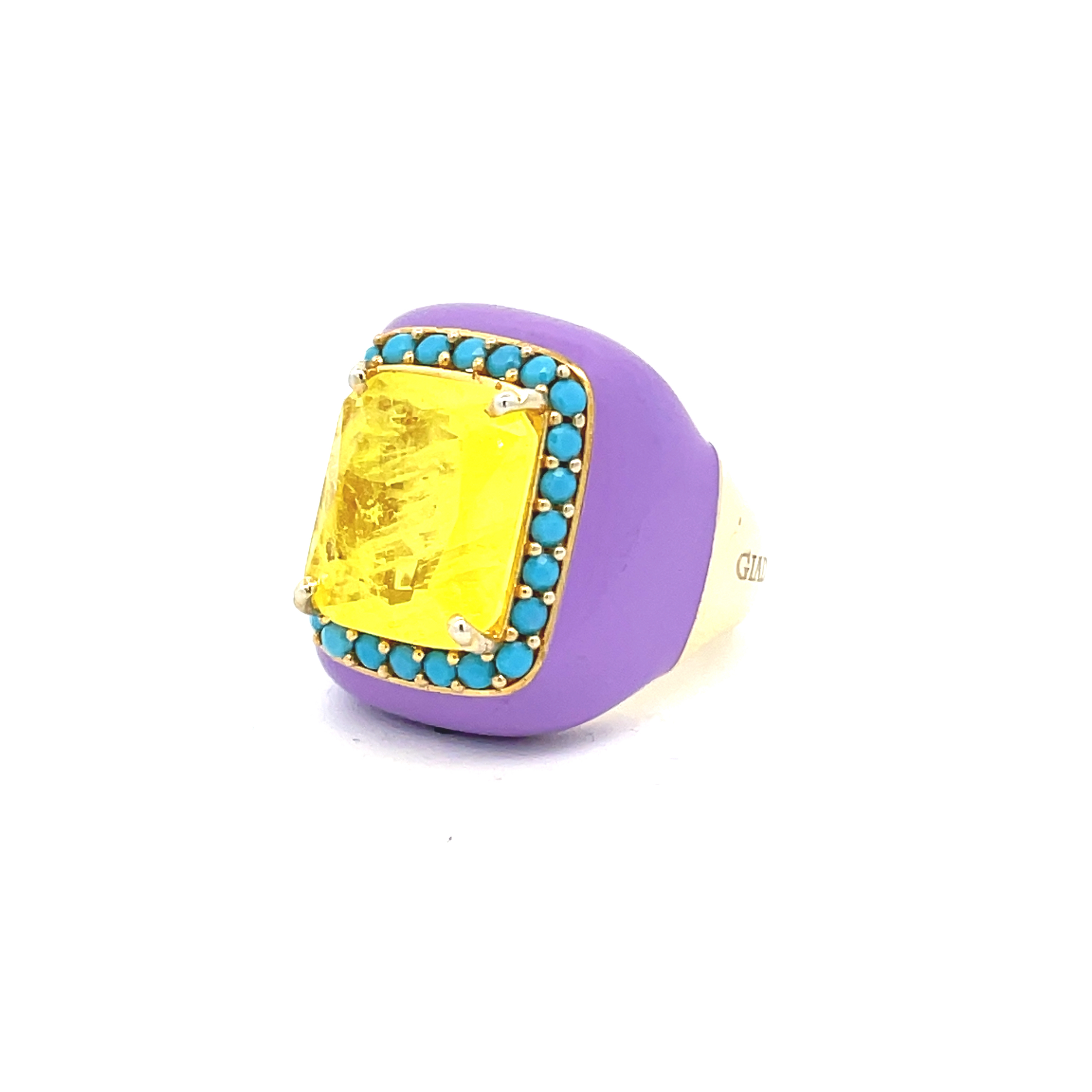 Yellow gold plated statement ring with lilac enamel, yellow doublette center stone and turquoise blue pavé zirconias viewed from side
